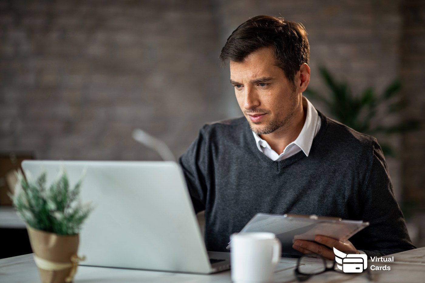 Finance director reviewing employee expense cards on a dashboard instead of paper expense reports.